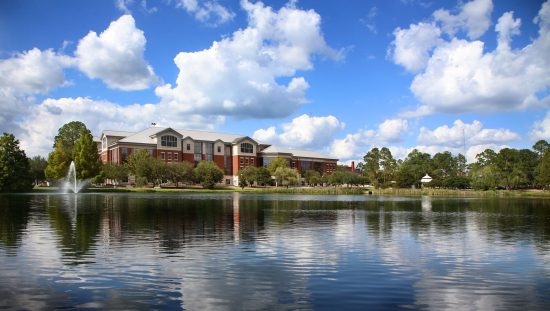 View of Henderson Library building from over the lake.